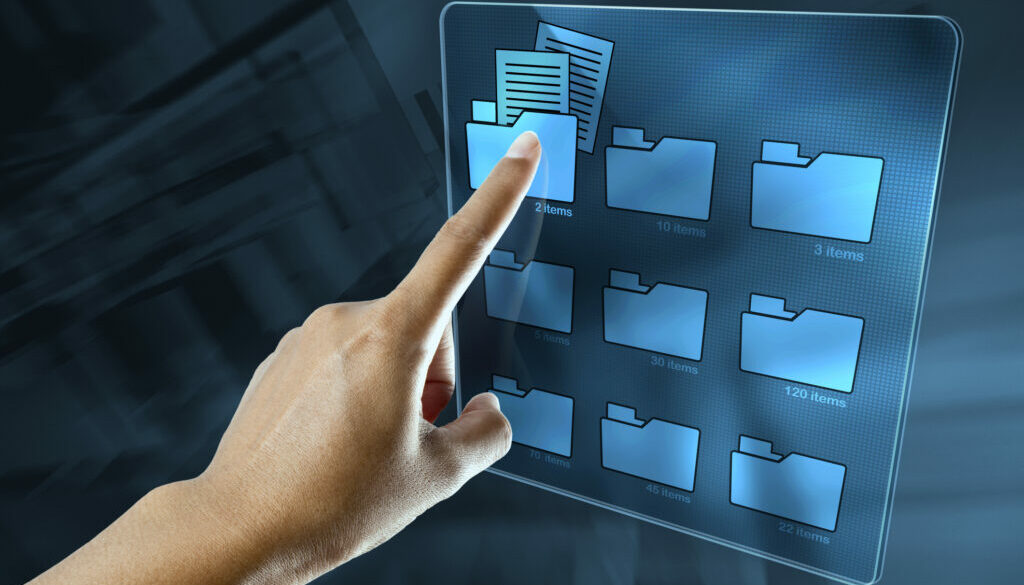 a woman hand is searching data in a folder on a digital screen