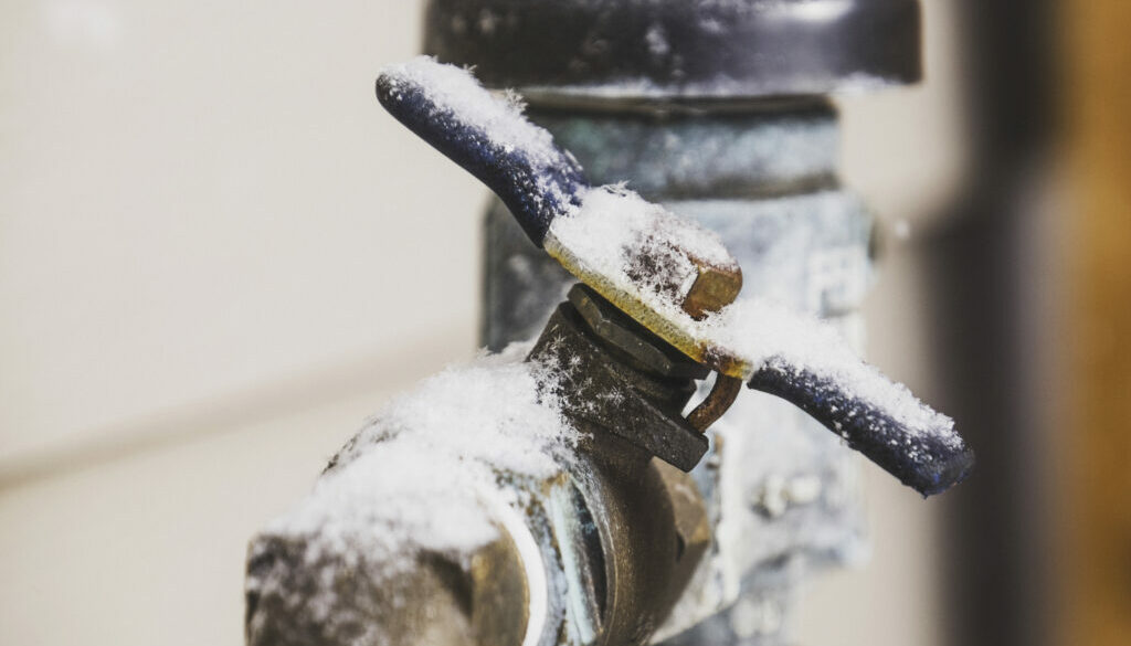 Frozen water shut off handle in snowstorm