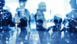 Business people work together in office with internet network effects. Concept of teamwork and partnership. double exposure